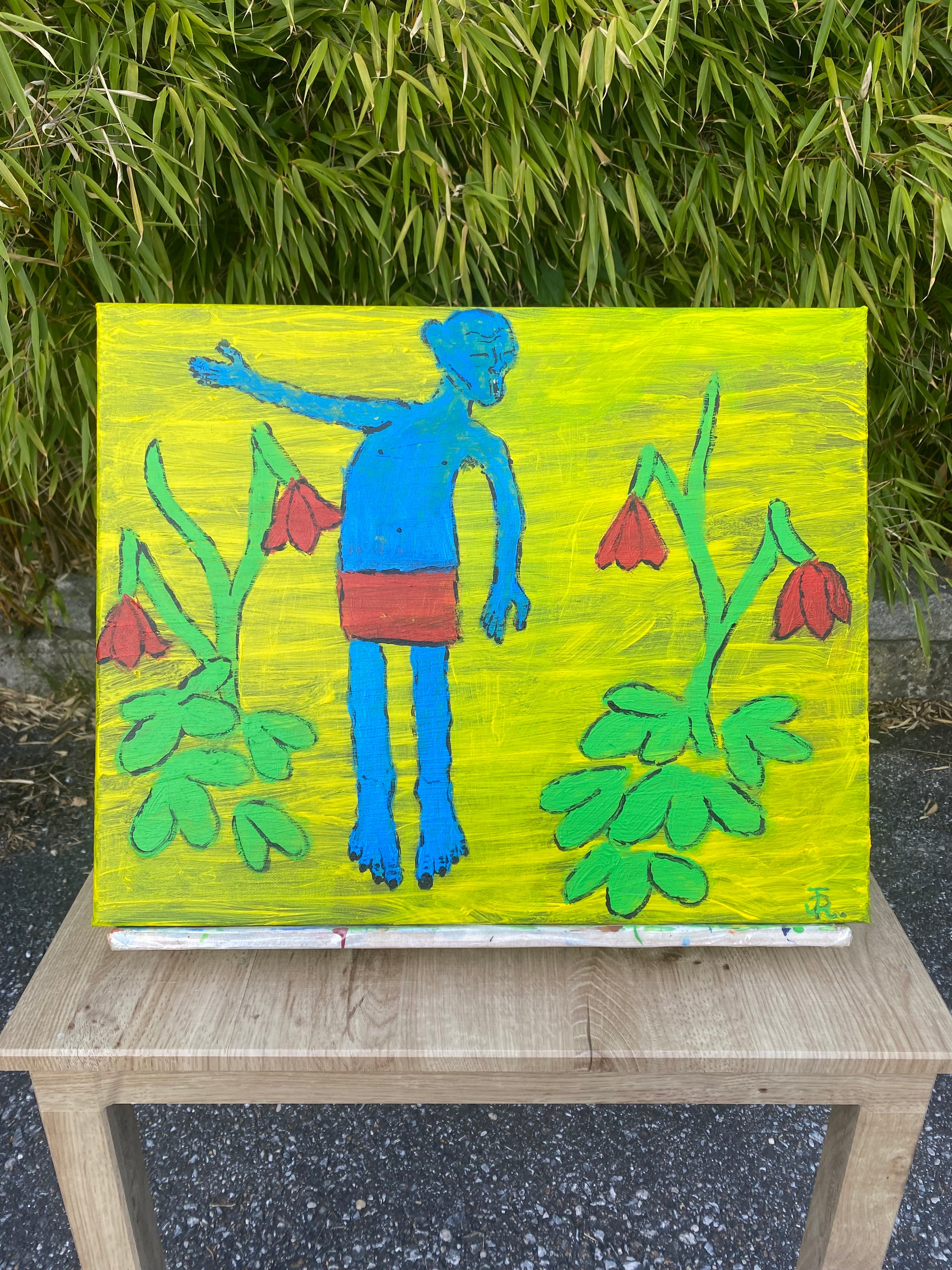 “der Mann zwischen Blumen“