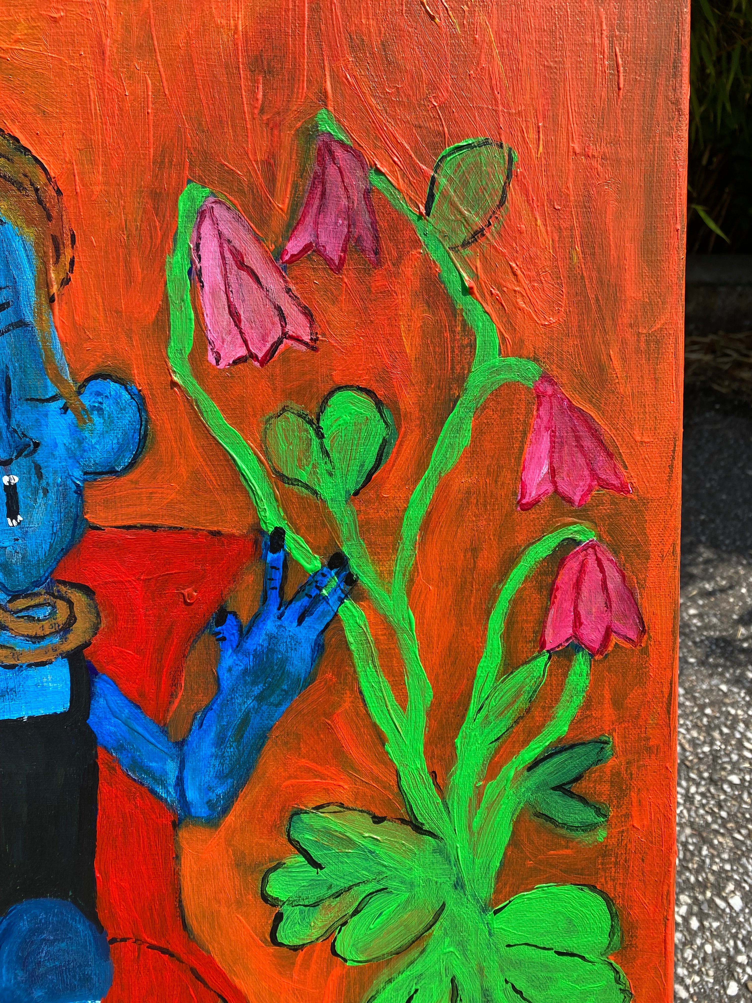 “das Mädchen neben Tisch und Blumen“
