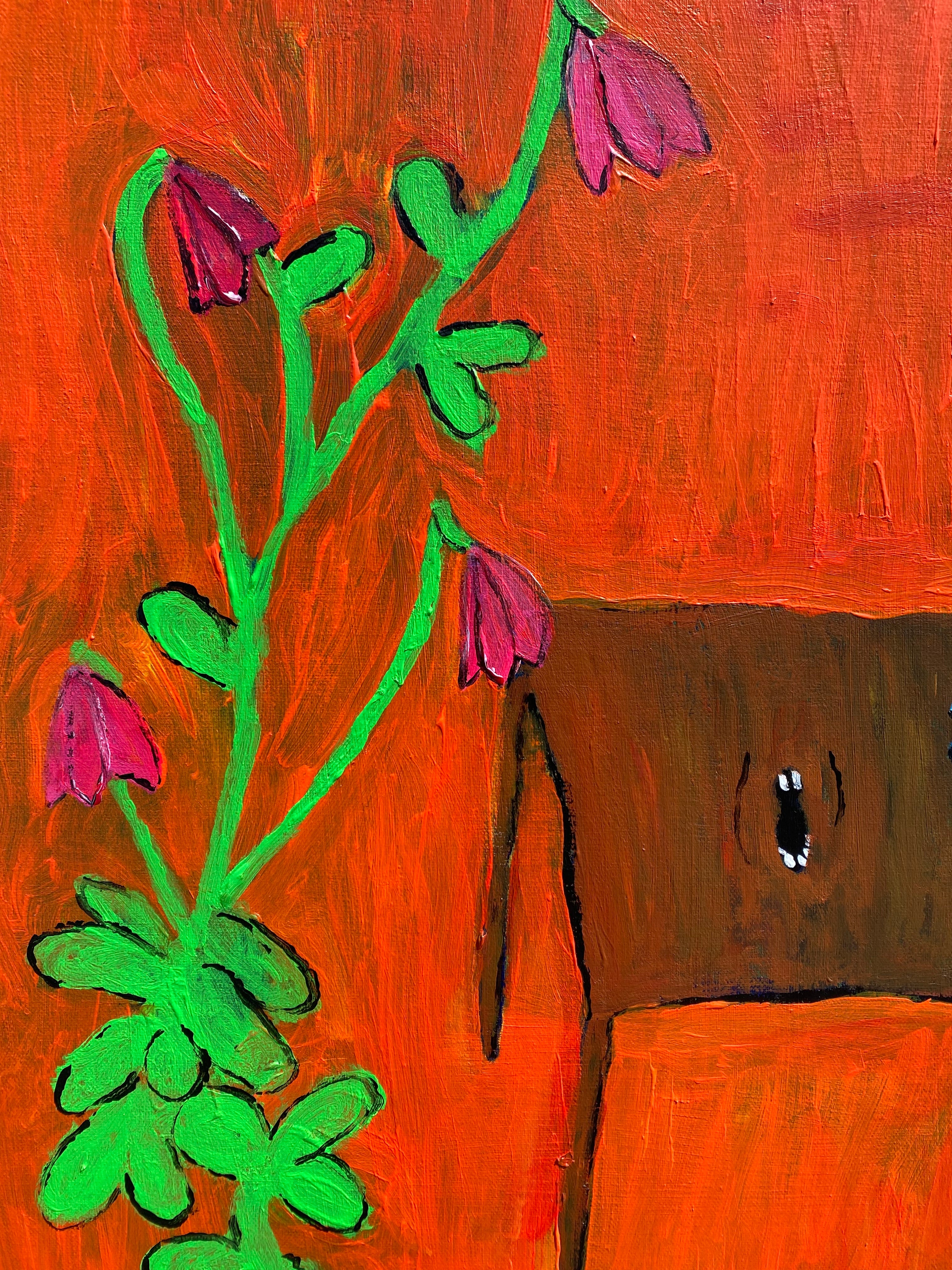 “das Mädchen neben Tisch und Blumen“