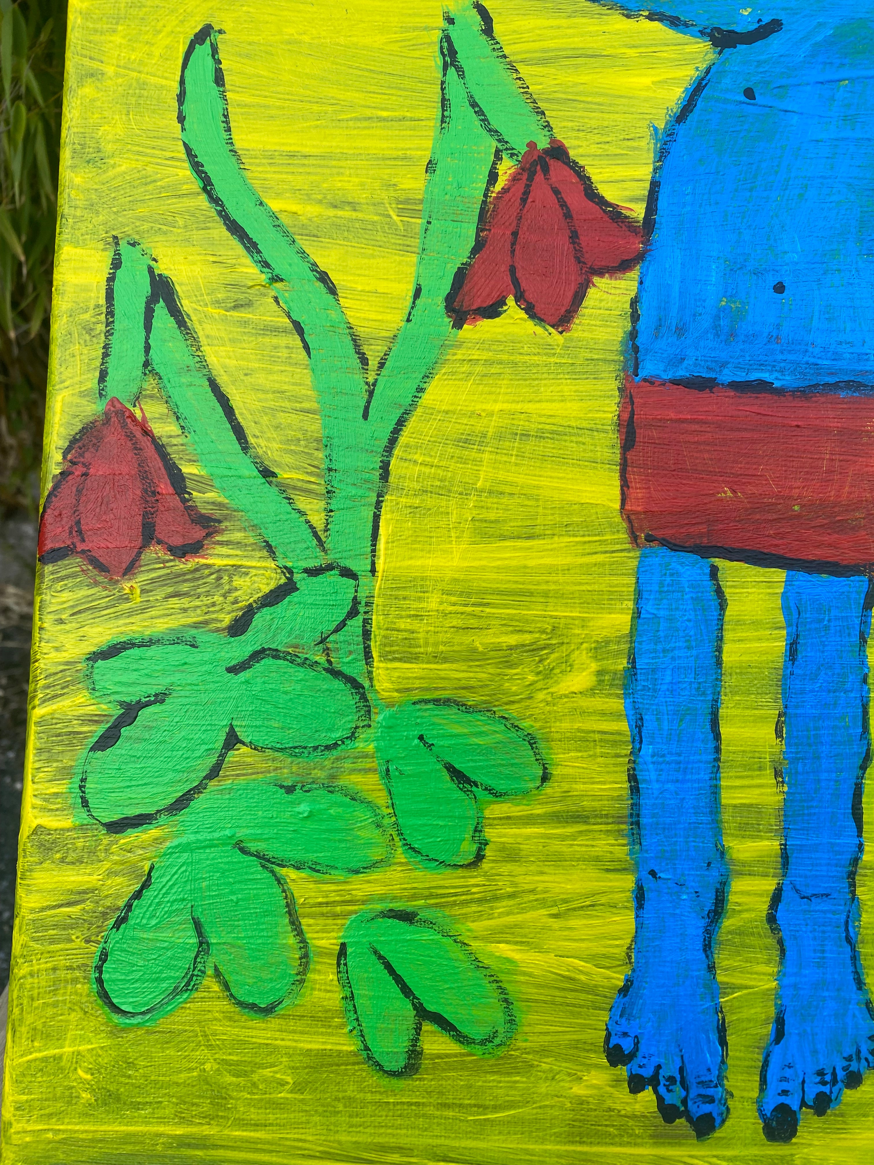 “der Mann zwischen Blumen“